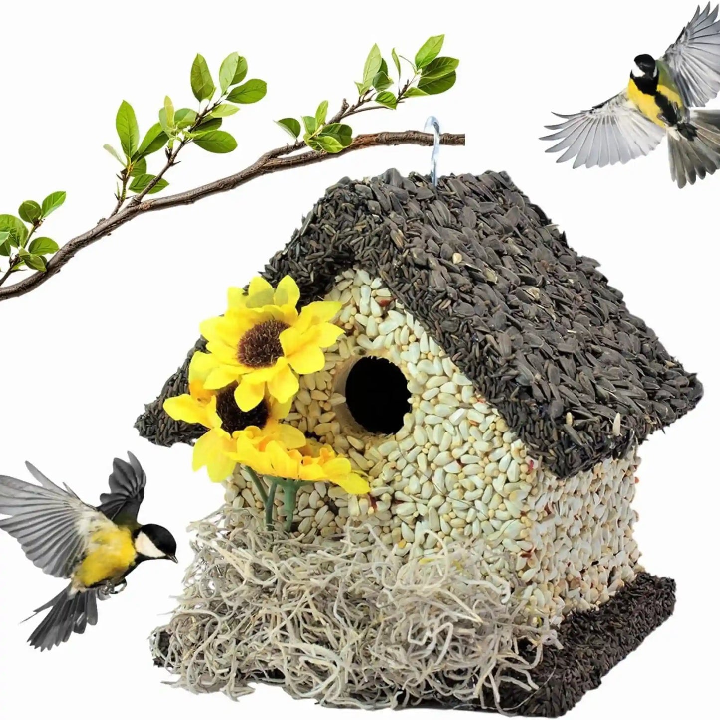 edible birdhouse covered in bird seed